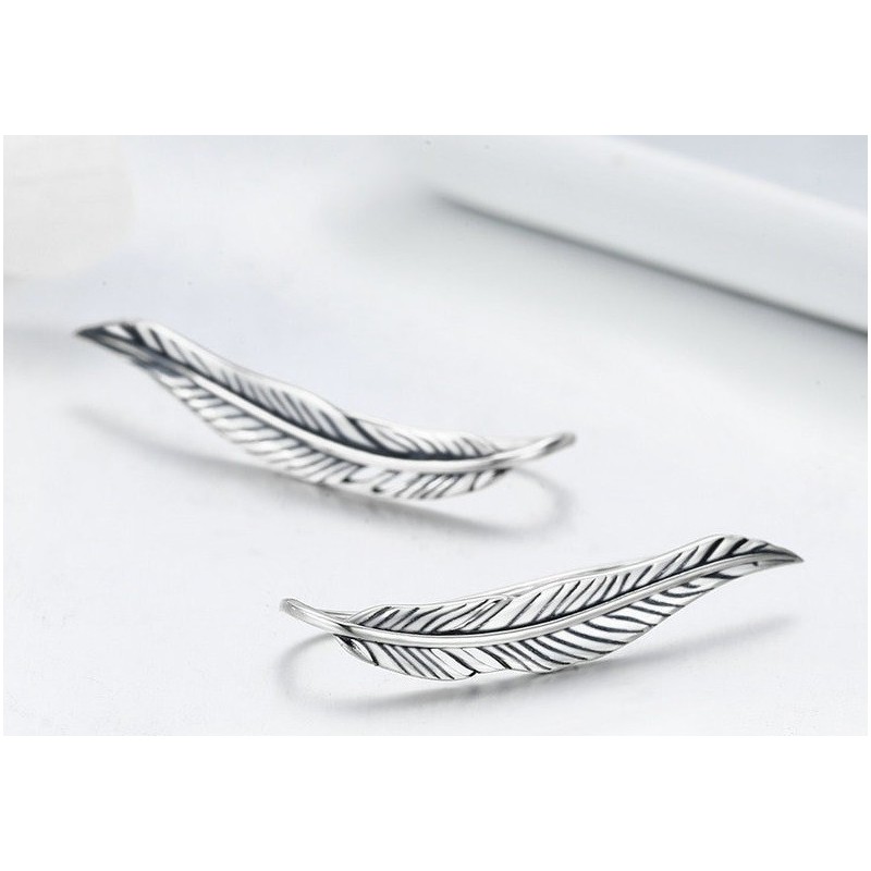Aretes largos en forma de hojas en plata