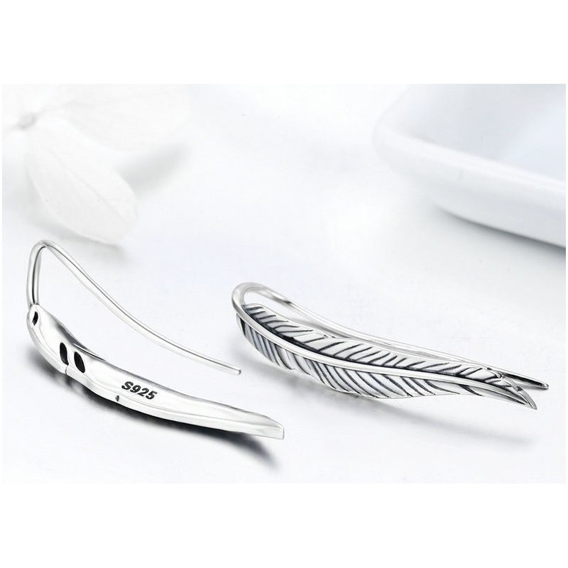 Aretes largos en forma de hojas en plata