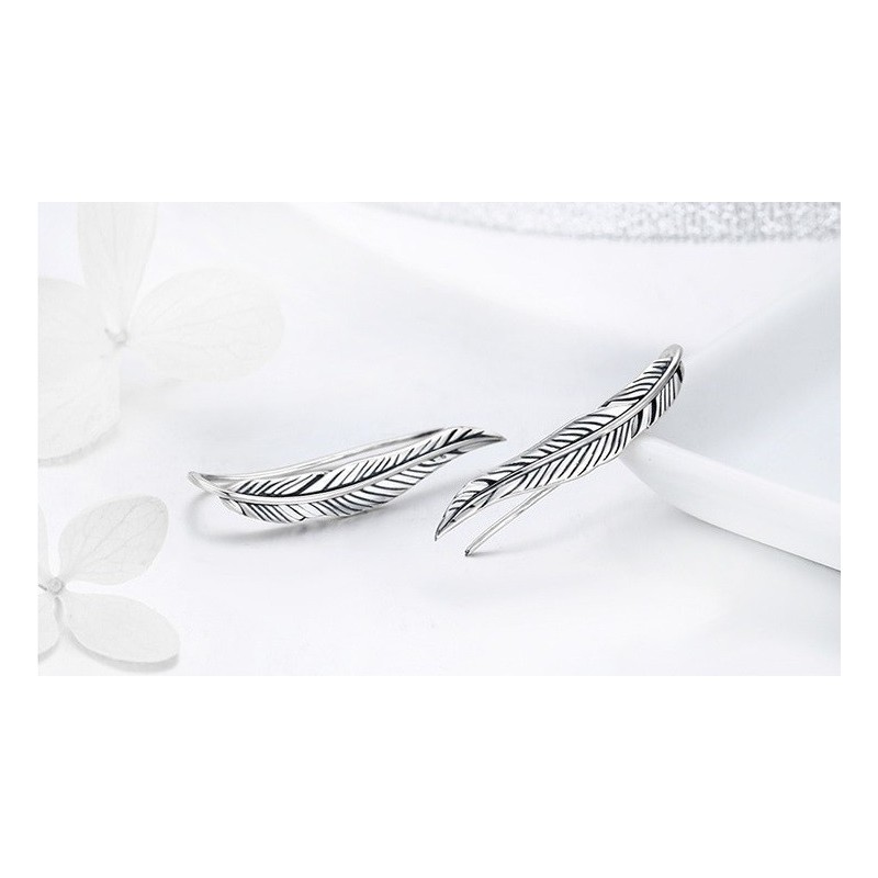 Aretes largos en forma de hojas en plata