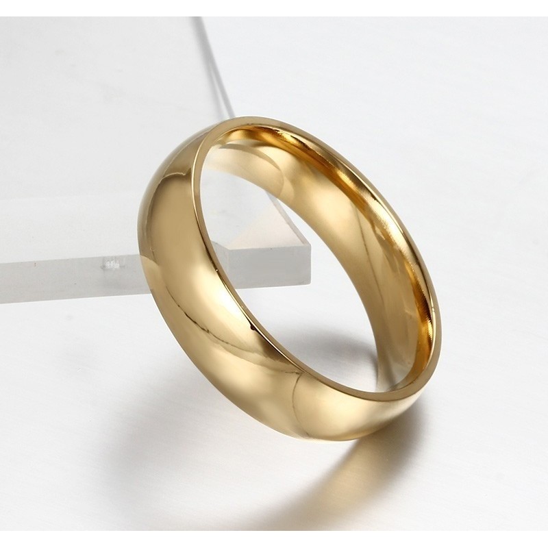 Argollas de matrimonio doradas en acero inoxidable