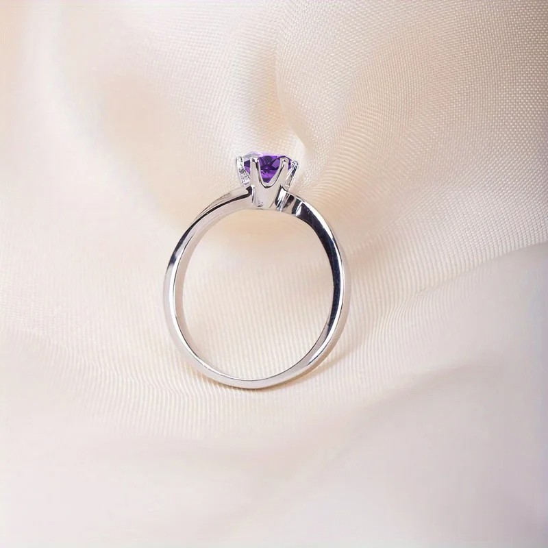 Anillo de compromiso en plata asimétrico con amatista