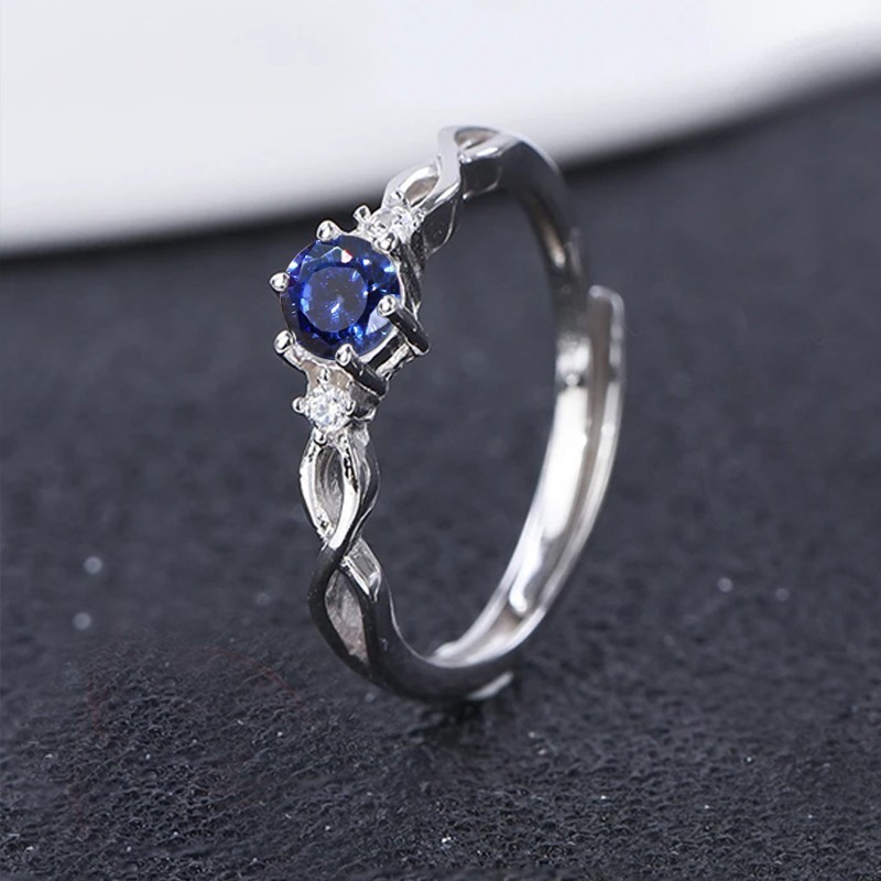 Anillo de compromiso en plata clásico infinito con zafiro