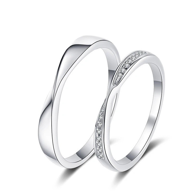 Argollas de matrimonio en plata inspiración lazo